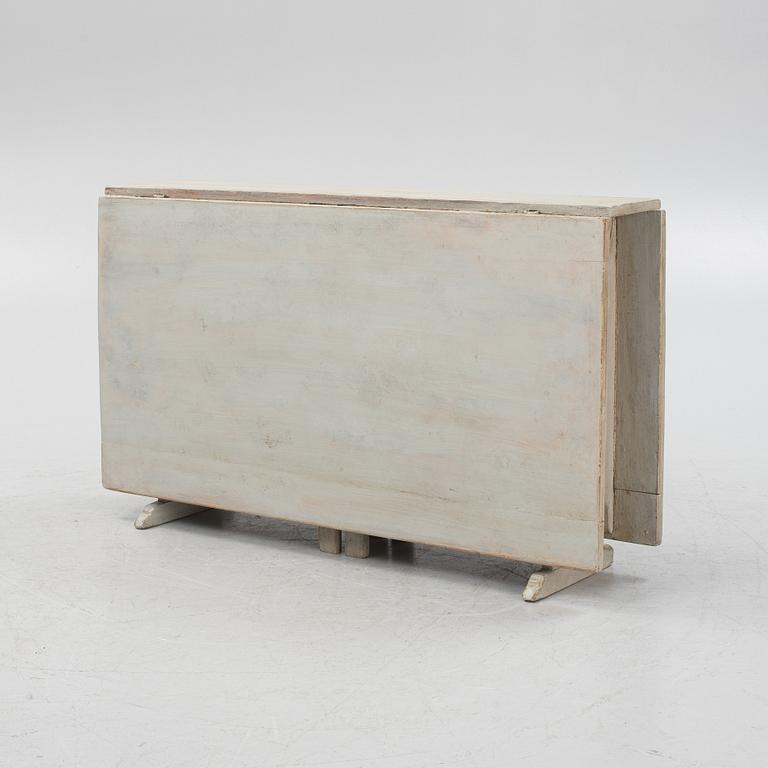 A painted gate-leg table, 19th Century.