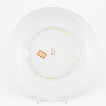 A Chinese famille rose mille fleur dish, 20th Century with Guangxu mark.