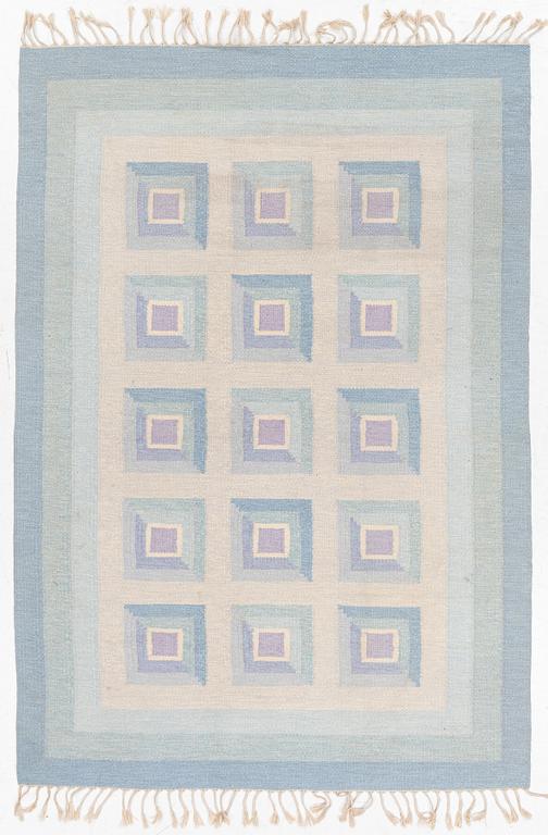 A flat weave rug, c. 240 x 163 cm.
