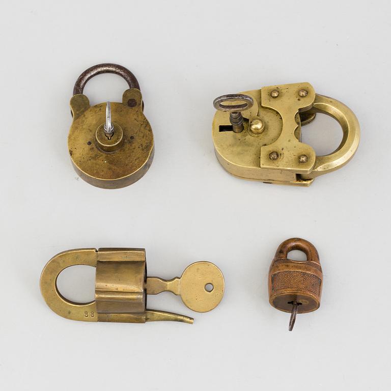 FOUR BRASS HANGING LOCKS, 19th/20th century.