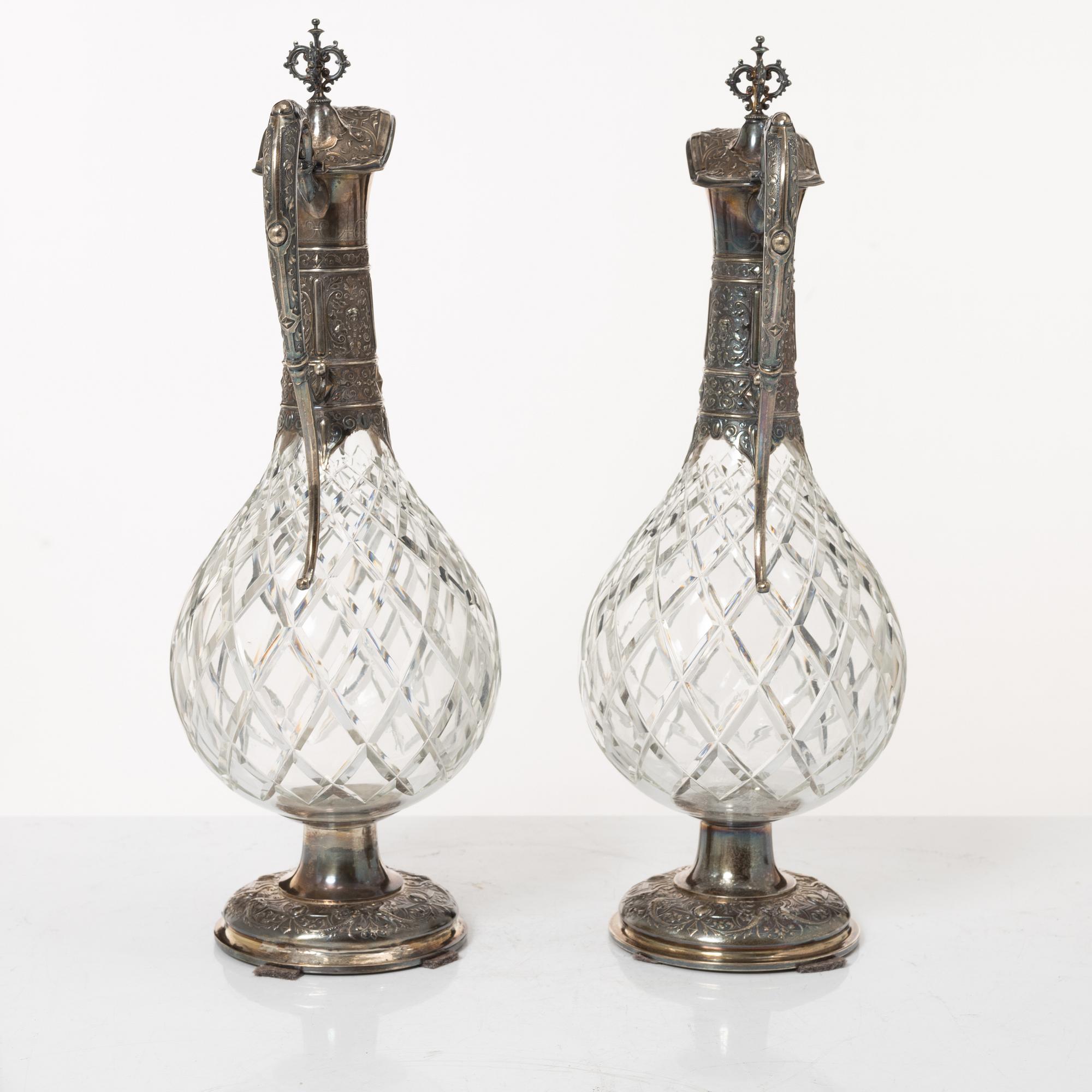 Decanters, a pair, silver and glass, with mark of G Möllenborg, Stockholm 1877.