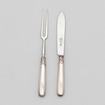 A 12-piece set of silver cutlery, a pair of salt cellars and salt spoons, Russia, around the turn of the 20th century.