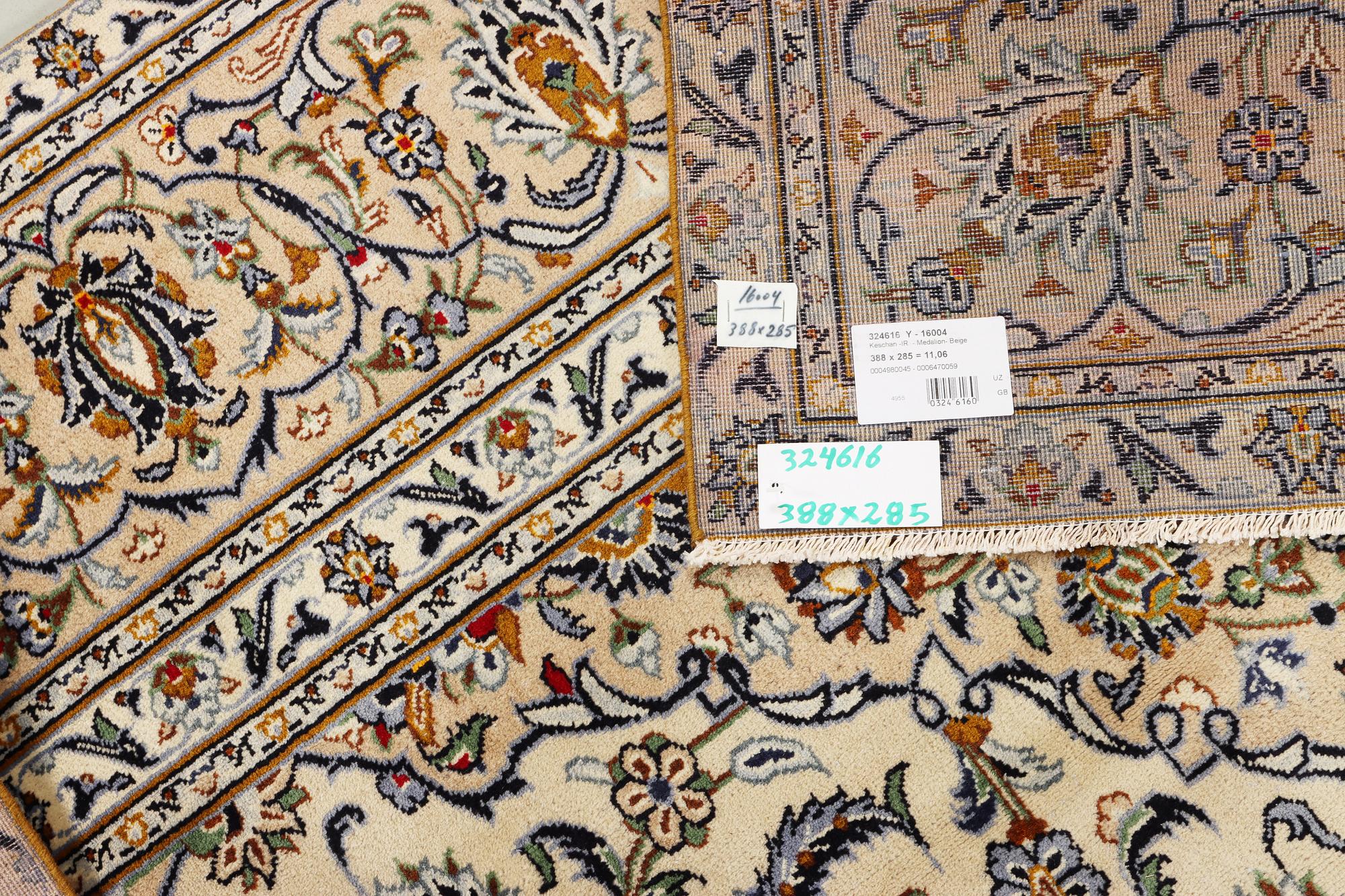 A Kashan carpet, c. 388 x 285 cm.