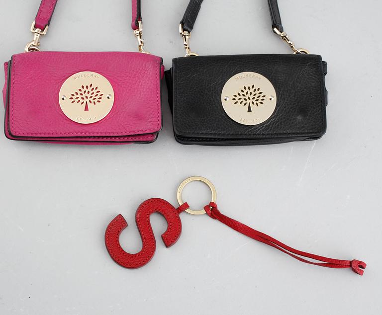 Two mobile cases named "Daria Mini Messenger" and a keyring from Mulberry.