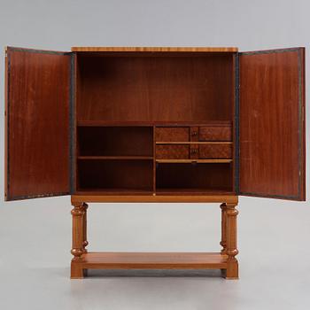 Otto Schulz, Boet, Gothenburg, probably, a cabinet covered with brown leather, dated 1942.