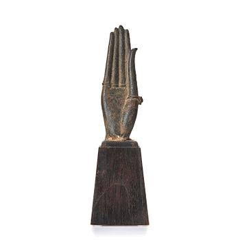 A bronze sculpture of buddhas hand, Thailand, 17th century.