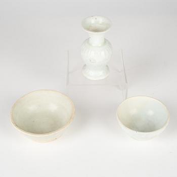 A qingbai vase and two lower parts of boxes, Song dynasty (960-1279).