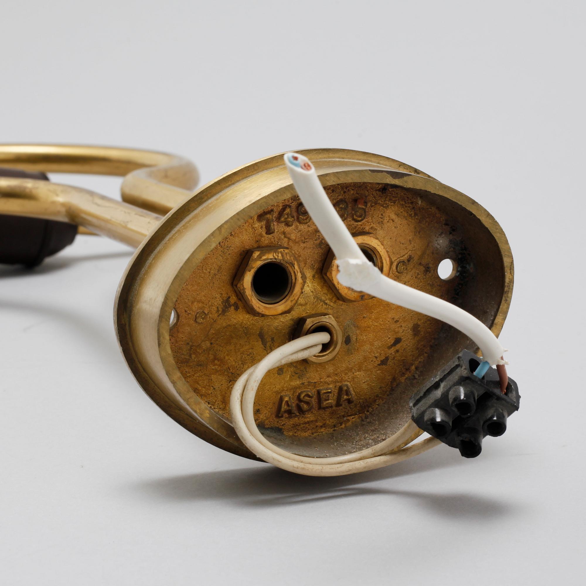 A pair of wall lamps from ASEA, around the mid 20th century.