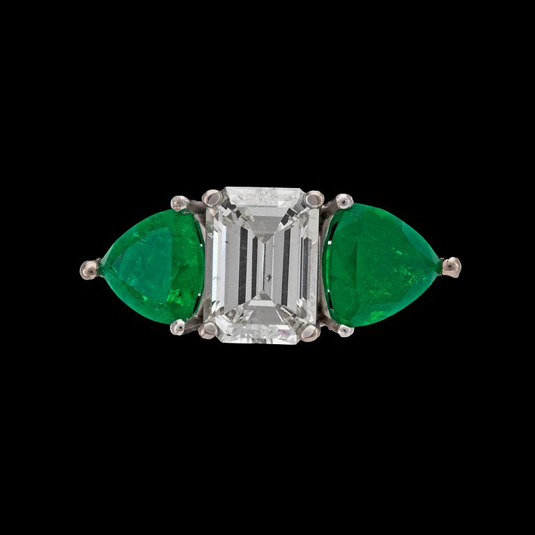 An emerald cut diamond and emerald ring, app. 2 cts.