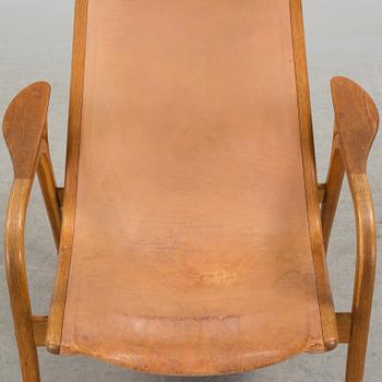 YNGVE EKSTRÖM, a 'Lamino' oak and teak easy chair from Swedese.