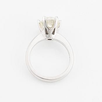 Ring, with cushion-cut diamond.