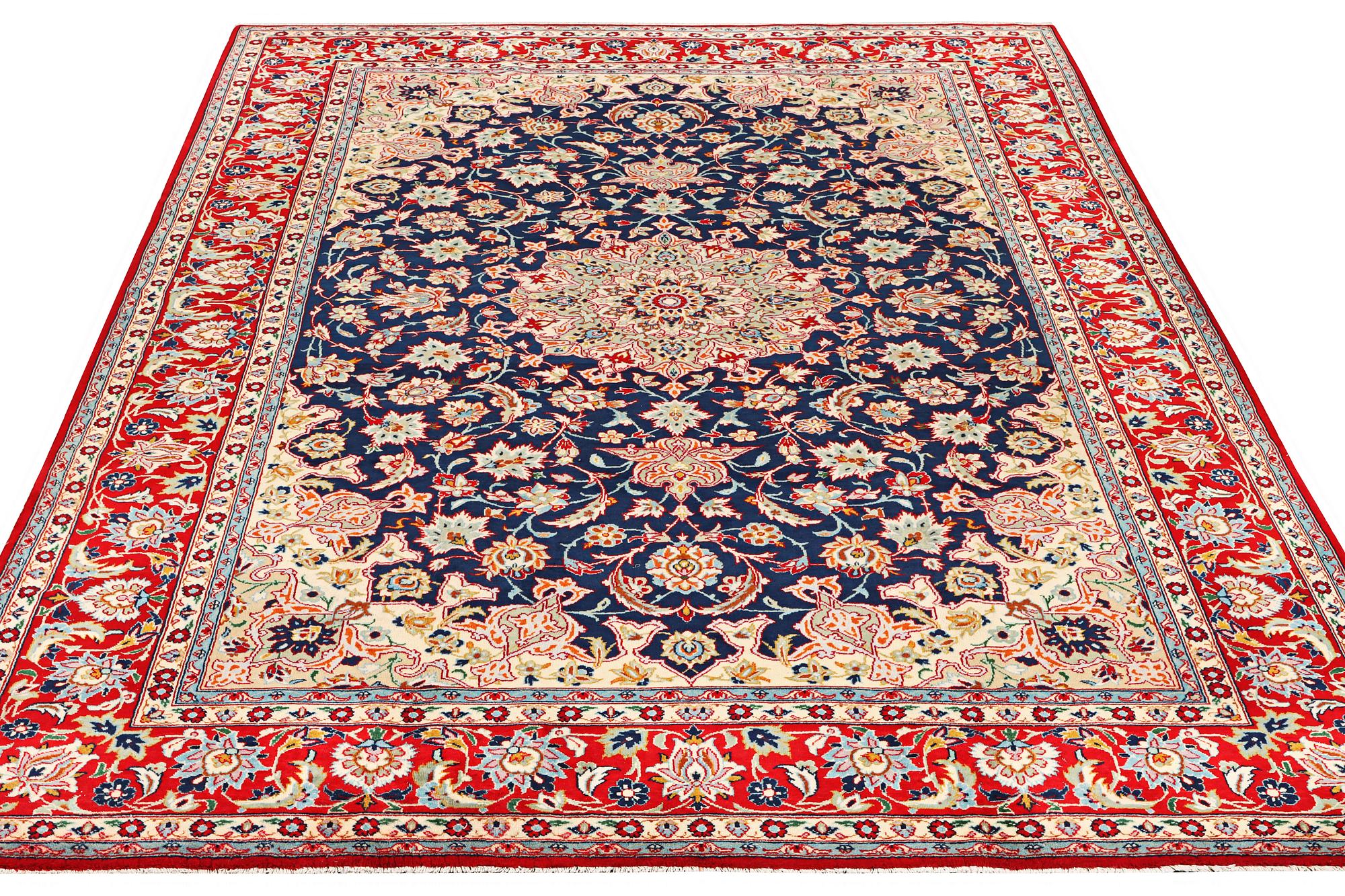A Kashan carpet, a. 365 x 257 cm.