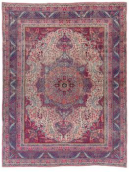 422. A semi-antique Kirman carpet, South Persia, c. 380 x 289 cm.