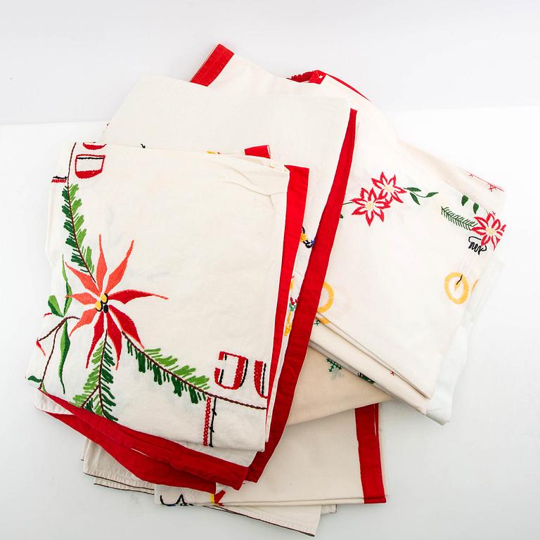 A collection of Christmas tablecloths, 13 pcs in larger sizes, 20th century.