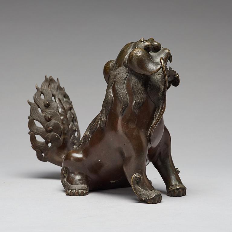 A bronze figure of a buddhist lion, Qing dynasty, 18/19th Century.