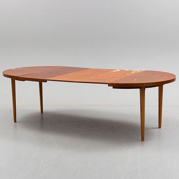 A 1940s mahogany veneer table.