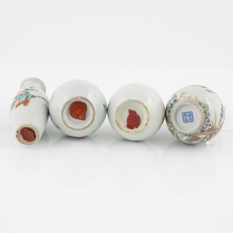 A set of eight Chinese vases, late Qing dynasty/20th Century.