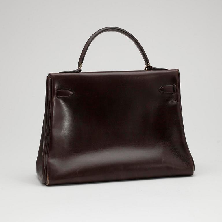 HERMÈS, a brown calf leather "Kelly 32" bag from the 1960s.
