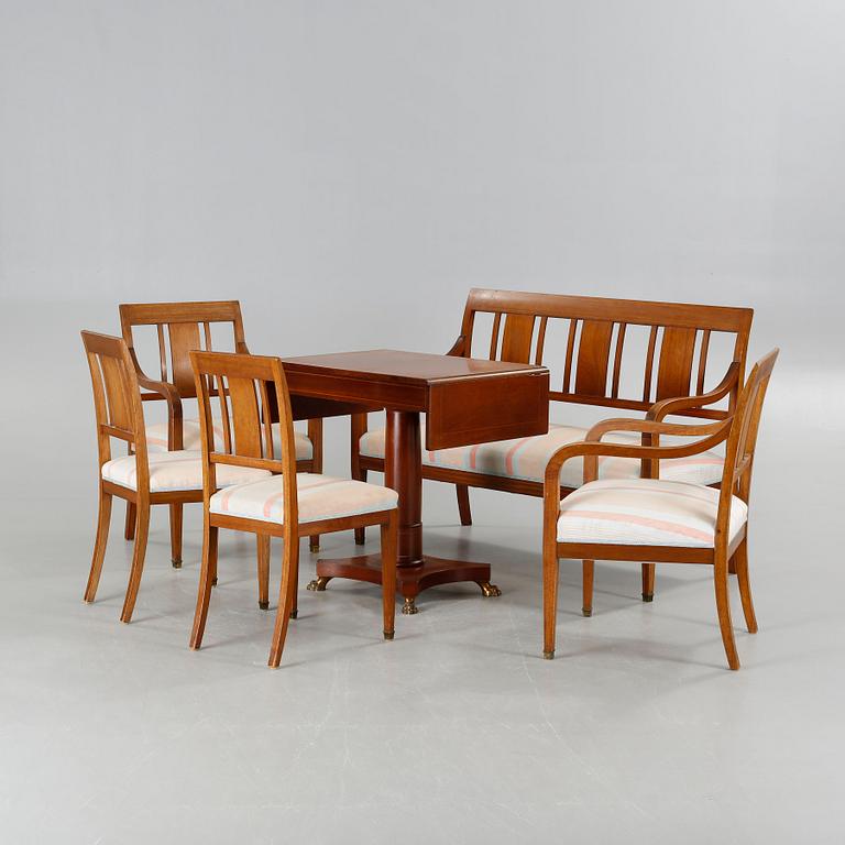 A sofa, six chairs and one table in Swedish Karl-Johan style, made in the first half of the 20th century.