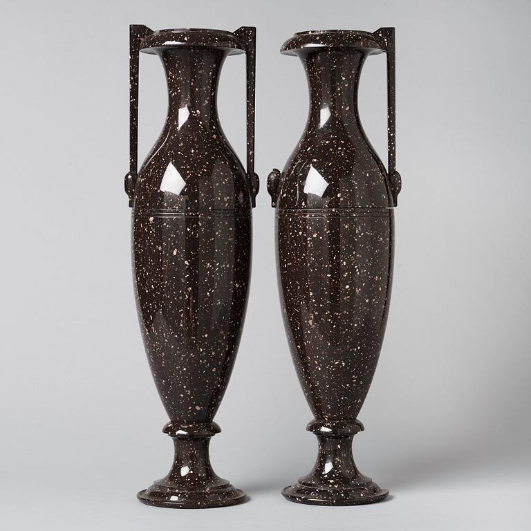 A pair of Swedish late Empire 19th century porphyry urns.