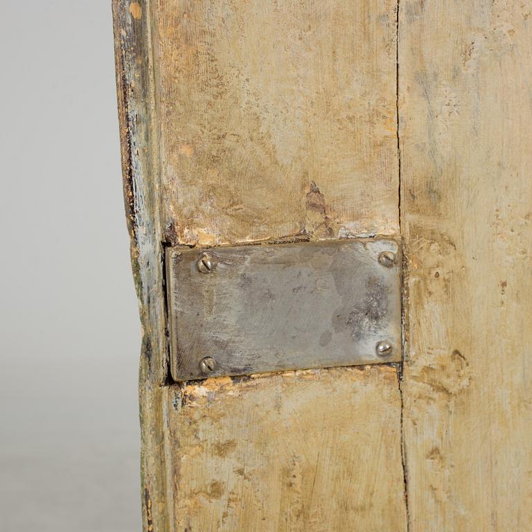 A 18th century corner cabinet.