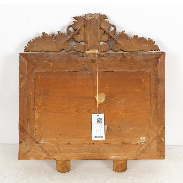 A mid 19th century mirror sconce.