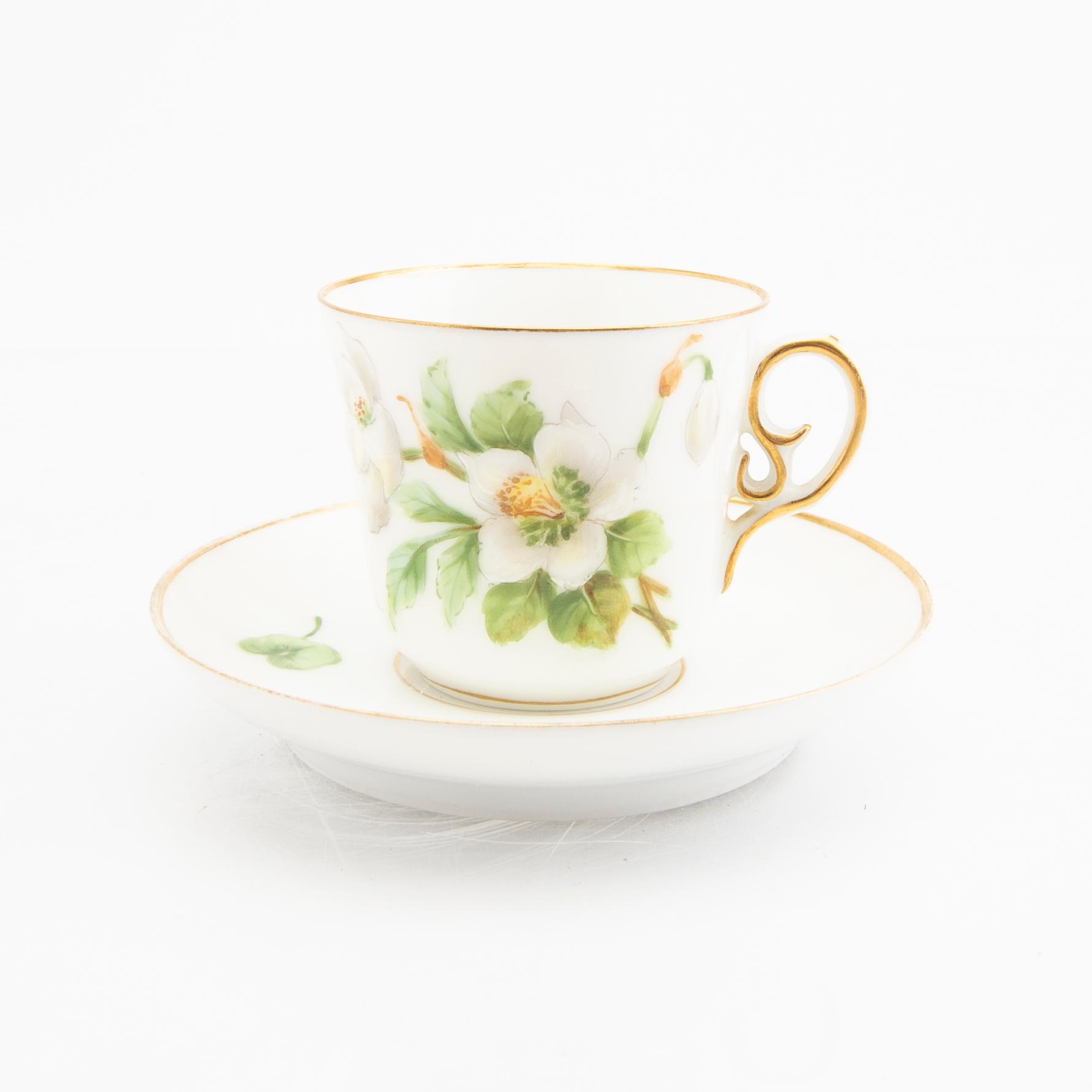A handpanted Royal Copenhagen 18 pcs coffee service.