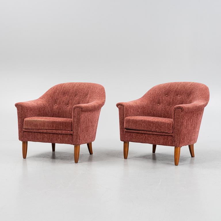 A pair of 1960s easy chairs.
