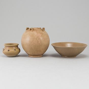 A brown glazed bowl and two pots, South East Asia, 17th Century or older.