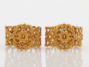 A pair of 19th century 18K gold bracelets.