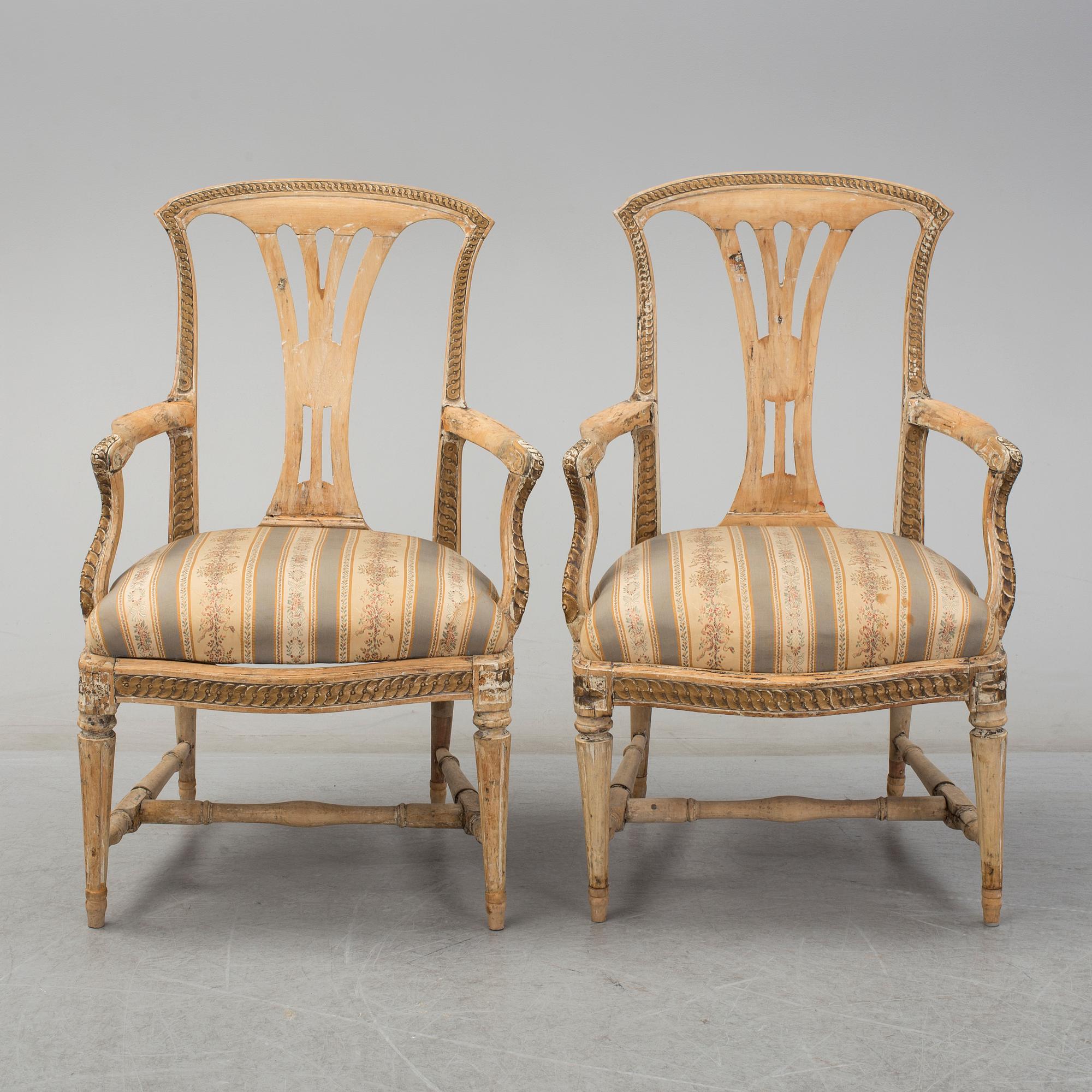 A pair of later part of th 18th century Gustavian arm chairs.