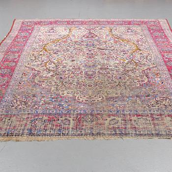 A semi-antique silk Kashan, ca 316 x 205.