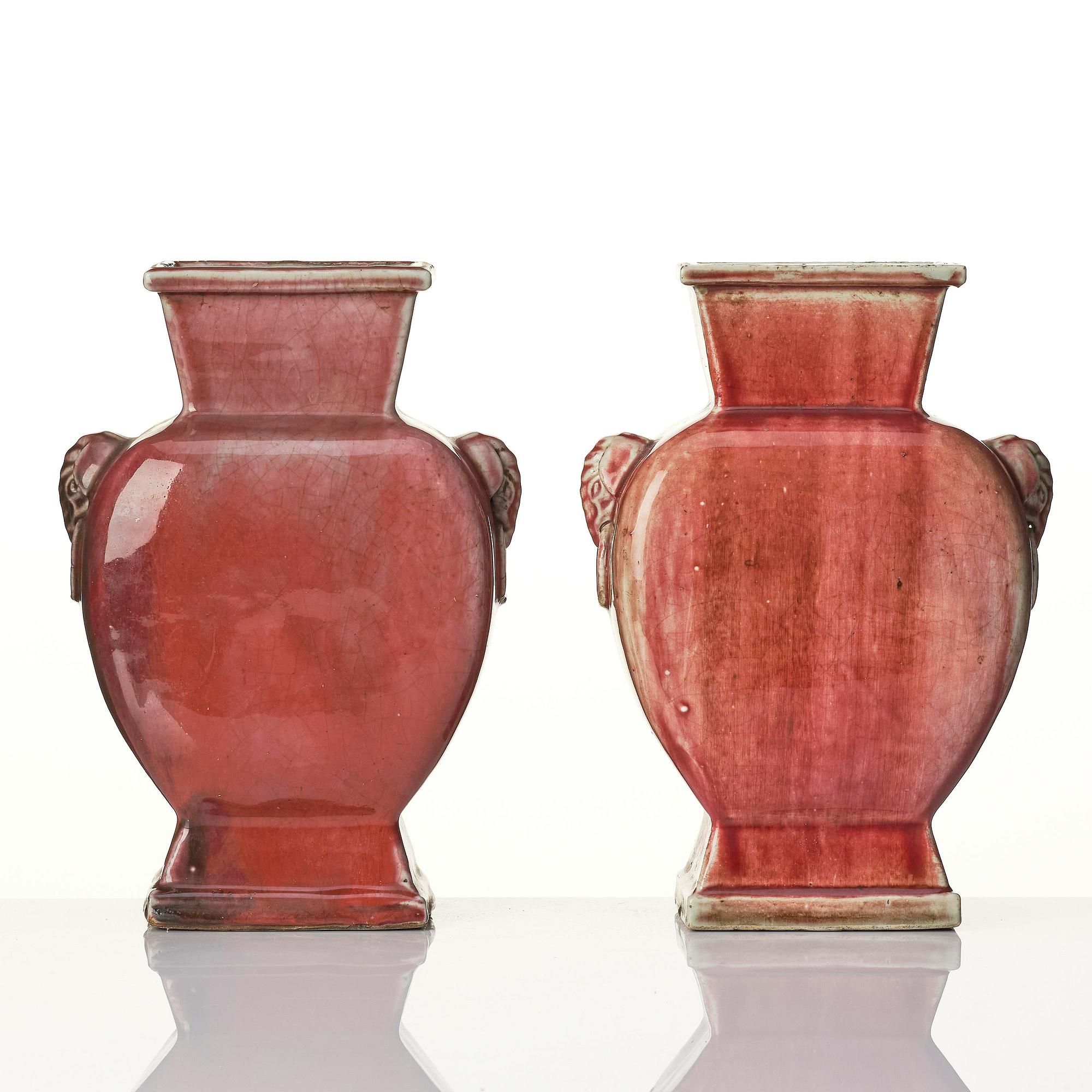 A pair of red glazed vases, Qing dynasty 18th/19th century.