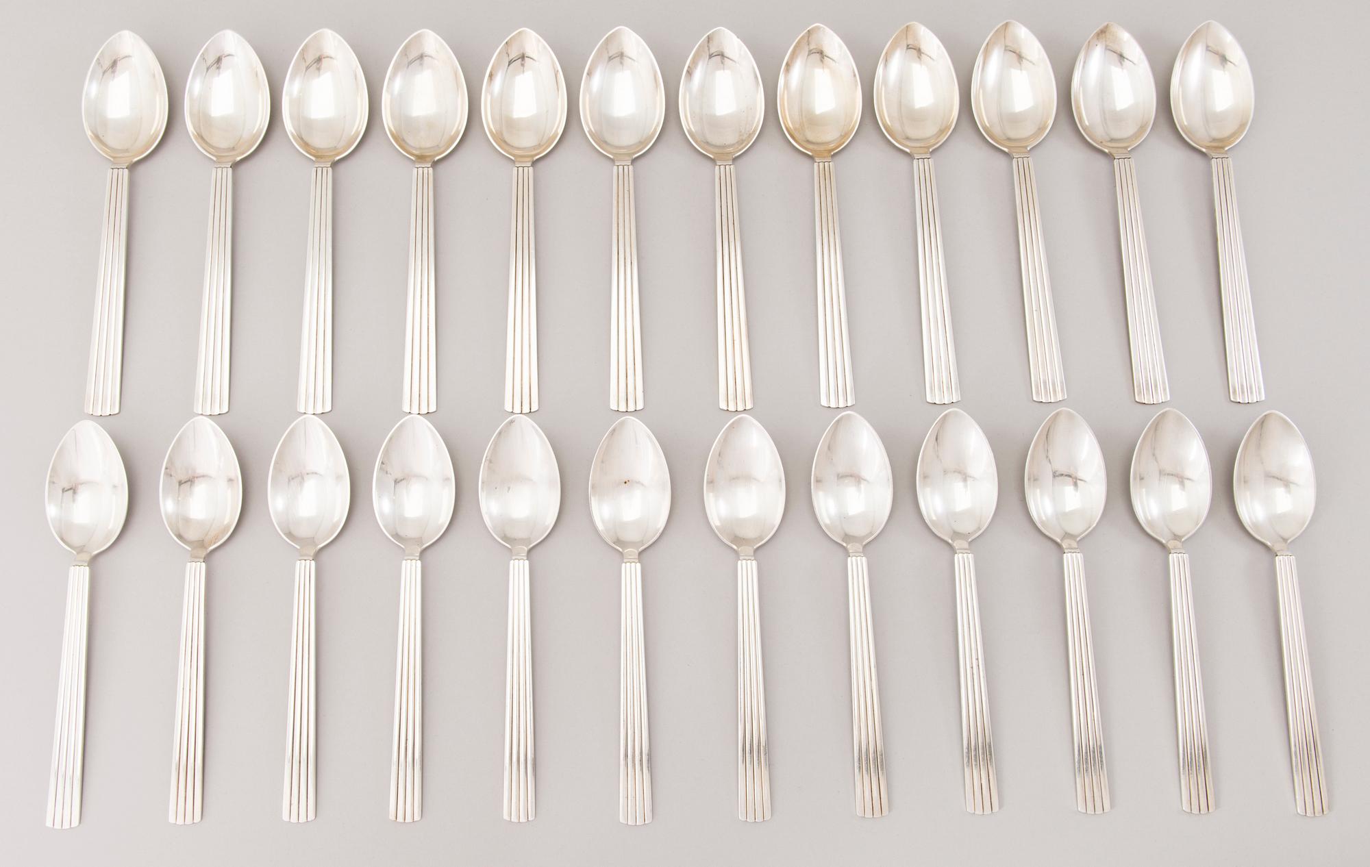 A 106 PIECE SILVER 'Bernadotte' cutlery set for George Jensen Denmark 1945-1977.