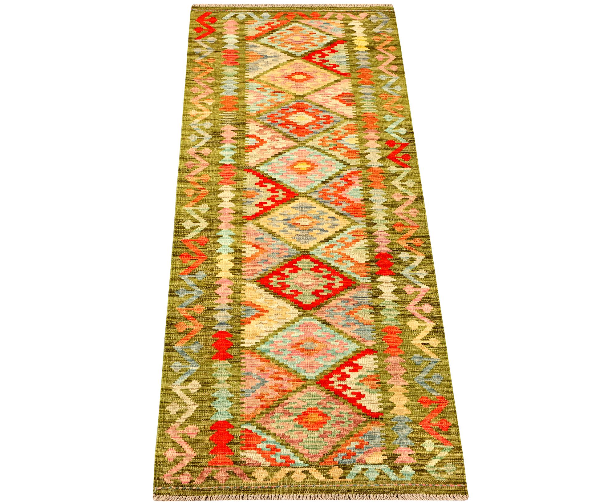 A runner carpet, kilim, c. 241 x 68 cm.