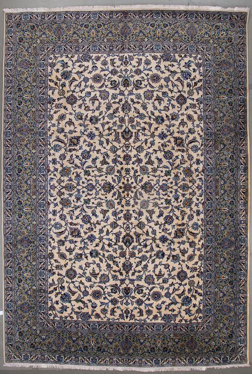 A carpet from Kashan, around 400 x 276 cm.