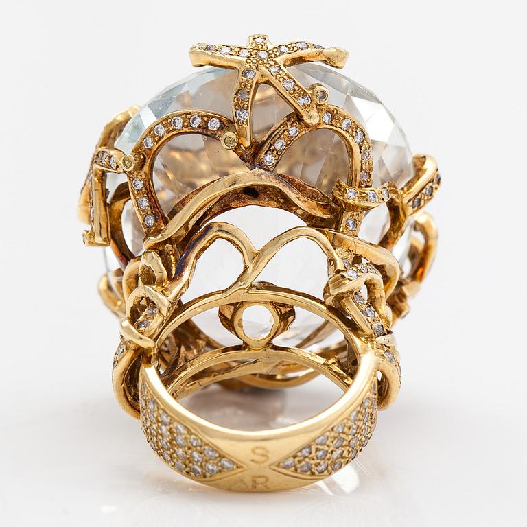 An 18K gold ring, topaz and diamonds  approx. 1.60ct in total, Sasha Ratiu Jewellery, London.