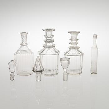 Three carafes and a glass bottle from the end of the 19th century.