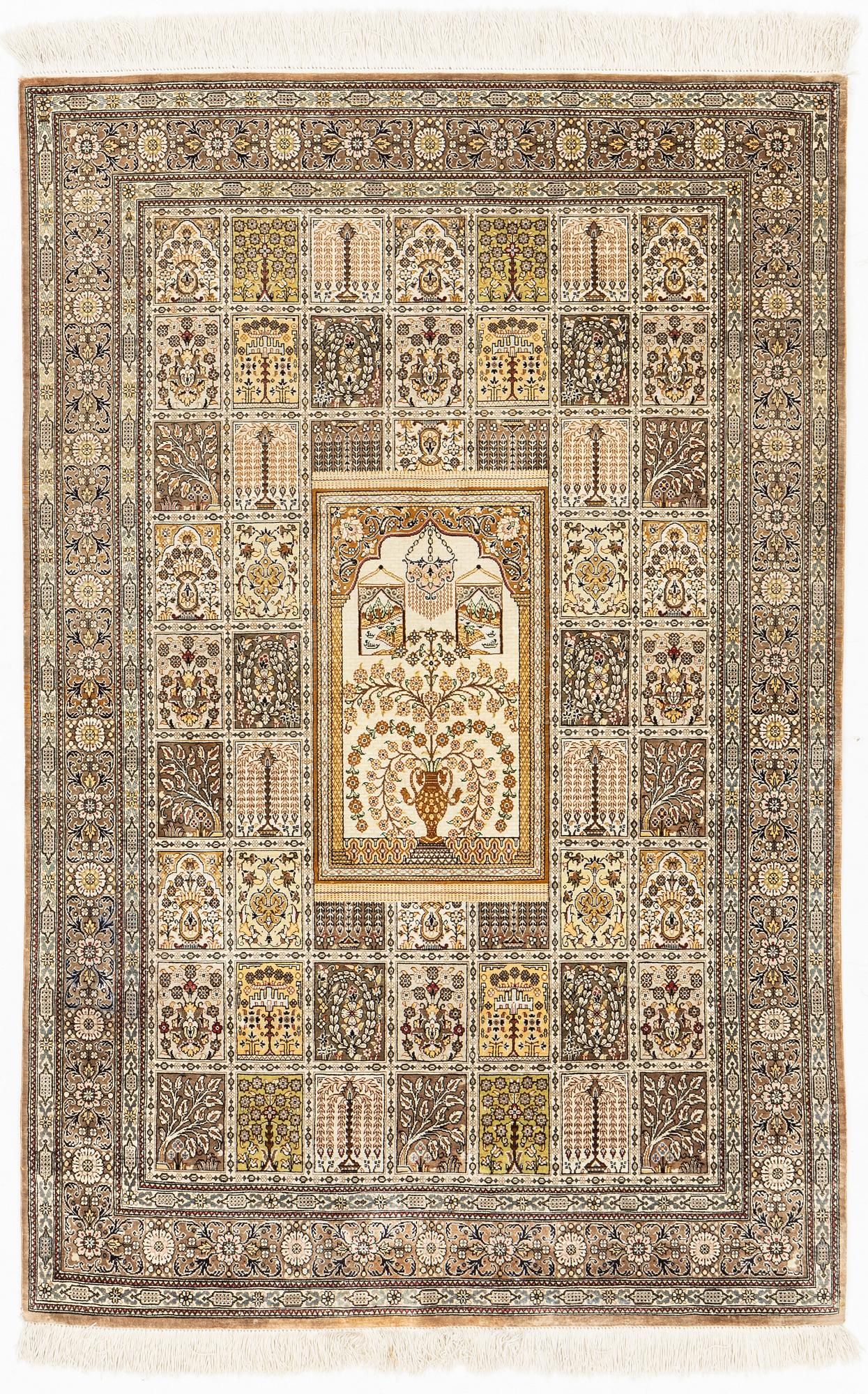 A carpet, oriental silk, circa 145 x 97 cm.