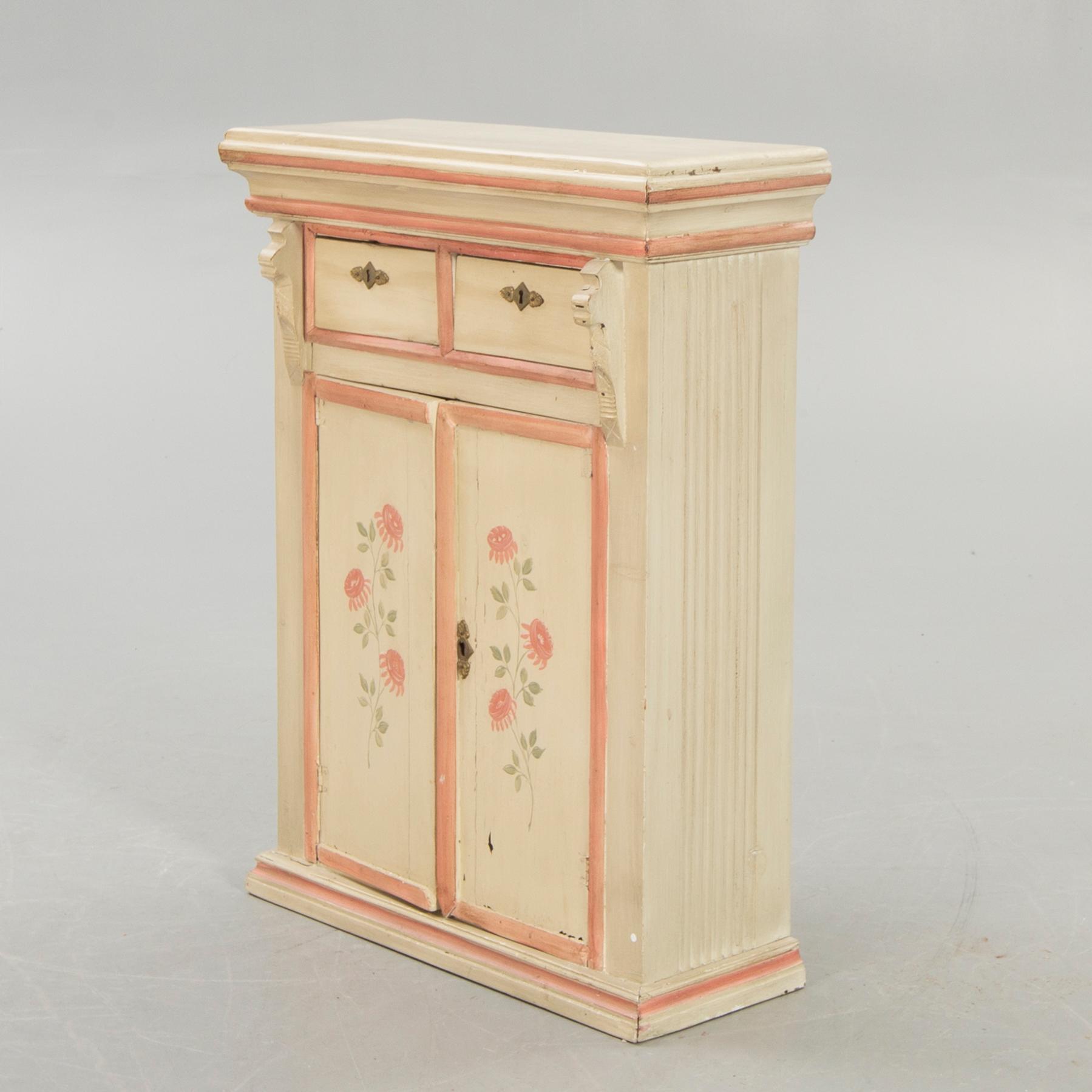 An 18th century painted cabinet.