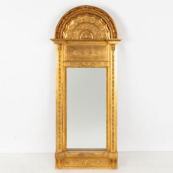 A giltwood Empire mirror by J. M. Berg (active in Gothenburg 1803- ca 1837).
