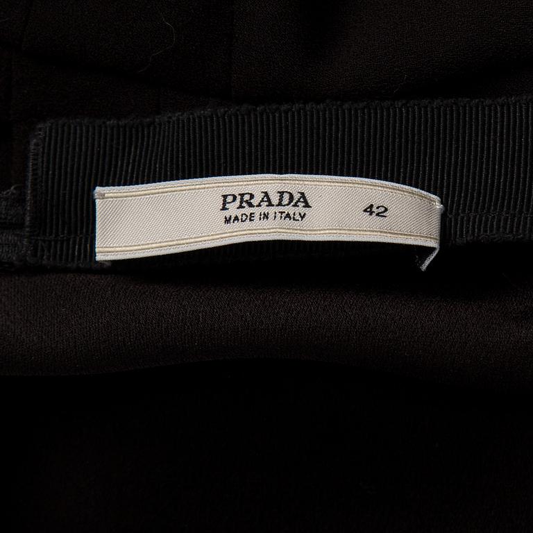 A black dress by Prada.