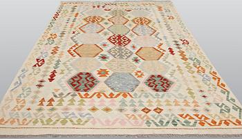 A Kilim carpet, ca 298 x 205 cm.