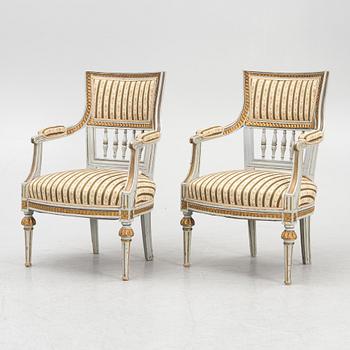 A pair of Gustavian style armchairs, 19th century.