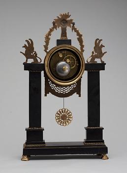 A French Louis XVI late 18th century gilt bronze and marble mantel clock.