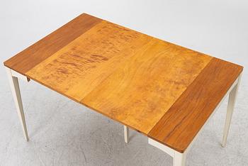 A dining table, mid-20th century.
