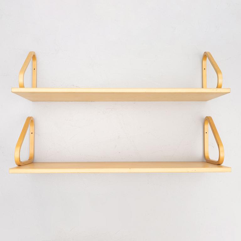 Alvar Aalto, a pair of wall shelves, model 112A, Artek, Finland, late 20th Century.