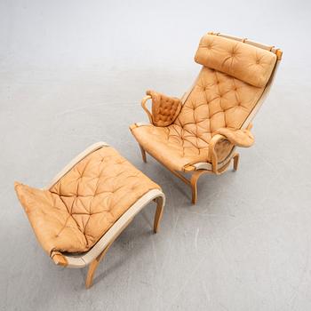 Bruno Mathsson, Armchair with footstool, "Pernilla", DUX, late 20th century.