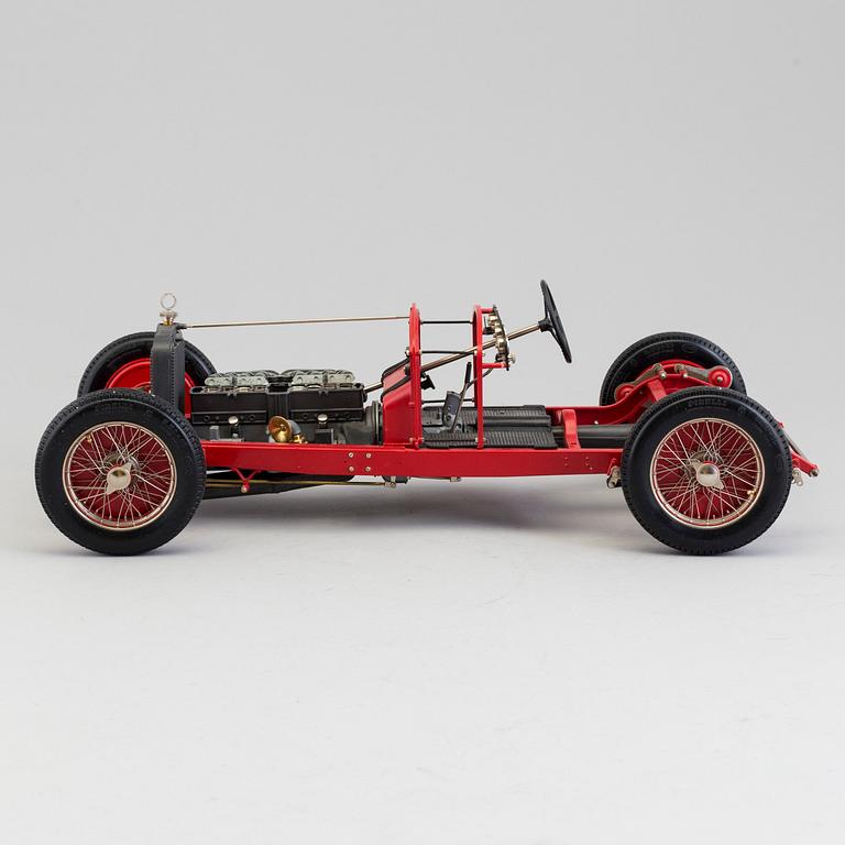 A plastic and metal model of an 1931 Alfa Romeo 8 C by Pocher.