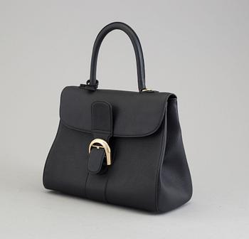 A Delvaux "Brillant" ladies handbag in black colored leather.